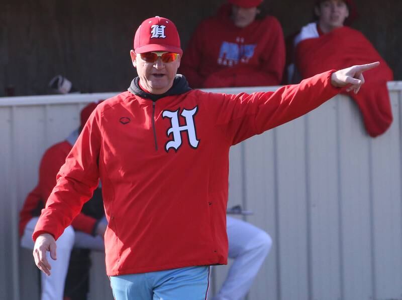 Hall head baseball coach Tom Keegan coaches his team against Ottawa on Tuesday, March 28, 2023 at Ottawa High School.