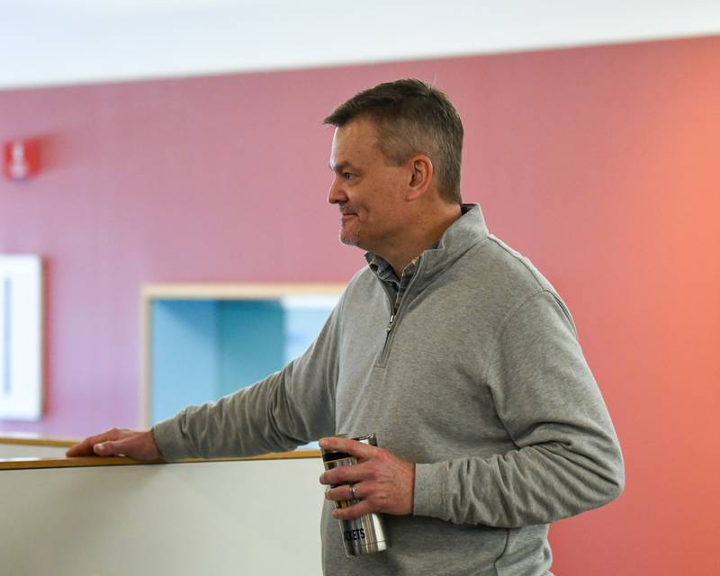 Downers Grove library board member Bill Nienburg talks with community members during coffee with board members event held on Saturday Feb. 17, 2024, held at the Downers Grove library.