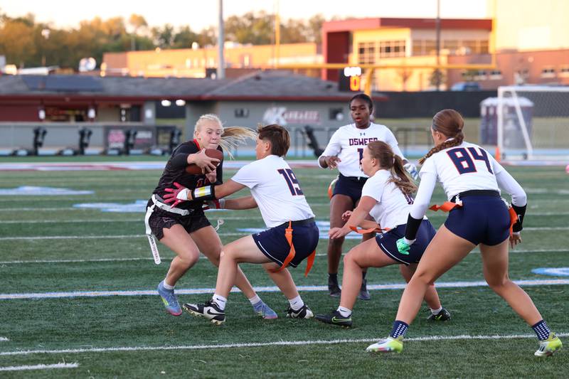 Yorkville's Brooke Ekwinski changes direction to avoid Oswego's Mak Hill during the Foxes' 2-1 overtime victory over Oswego in the IHSA Kankakee Regional championship game on Thursday, Oct. 9, 2025.