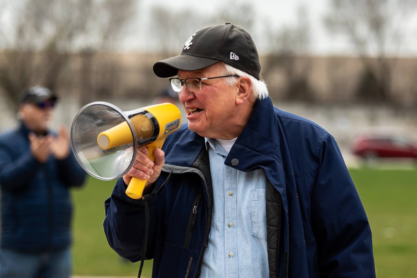 Former Illinois State Senator Pat McGuire addresses the crowd at the Hands Off protest in Downtown Joliet on April 5, 2025.