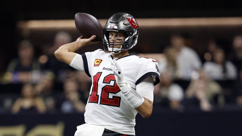 Tampa Bay Buccaneers quarterback Tom Brady (12) throws a pass in-between plays during an NFL football game against against the New Orleans Saints, Sunday, Sept. 18, 2022, in New Orleans. (AP Photo/Tyler Kaufman)