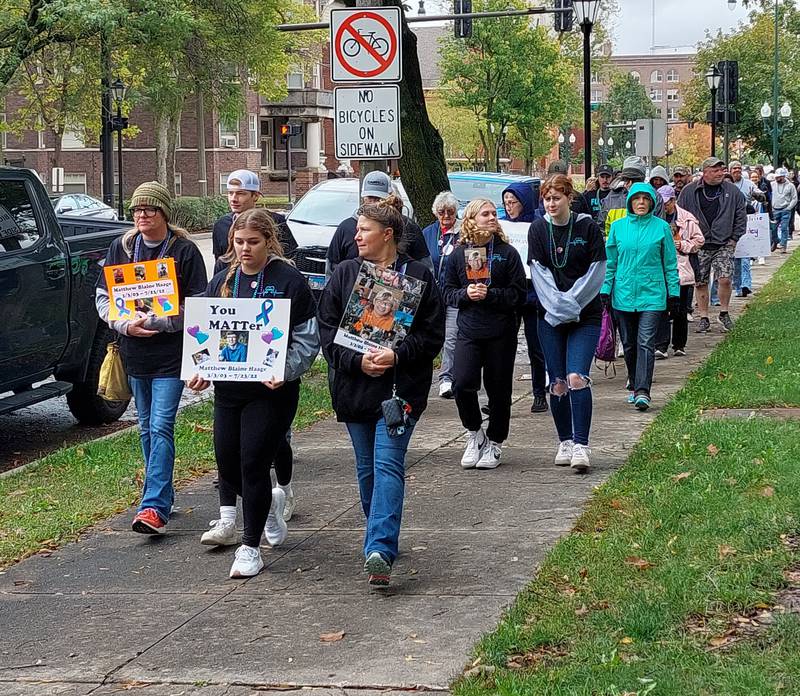 Hundreds of walkers participate in the Out of the Darkness Walk on Saturday, Oct. 14, 2023, at Washington Square in Ottawa.