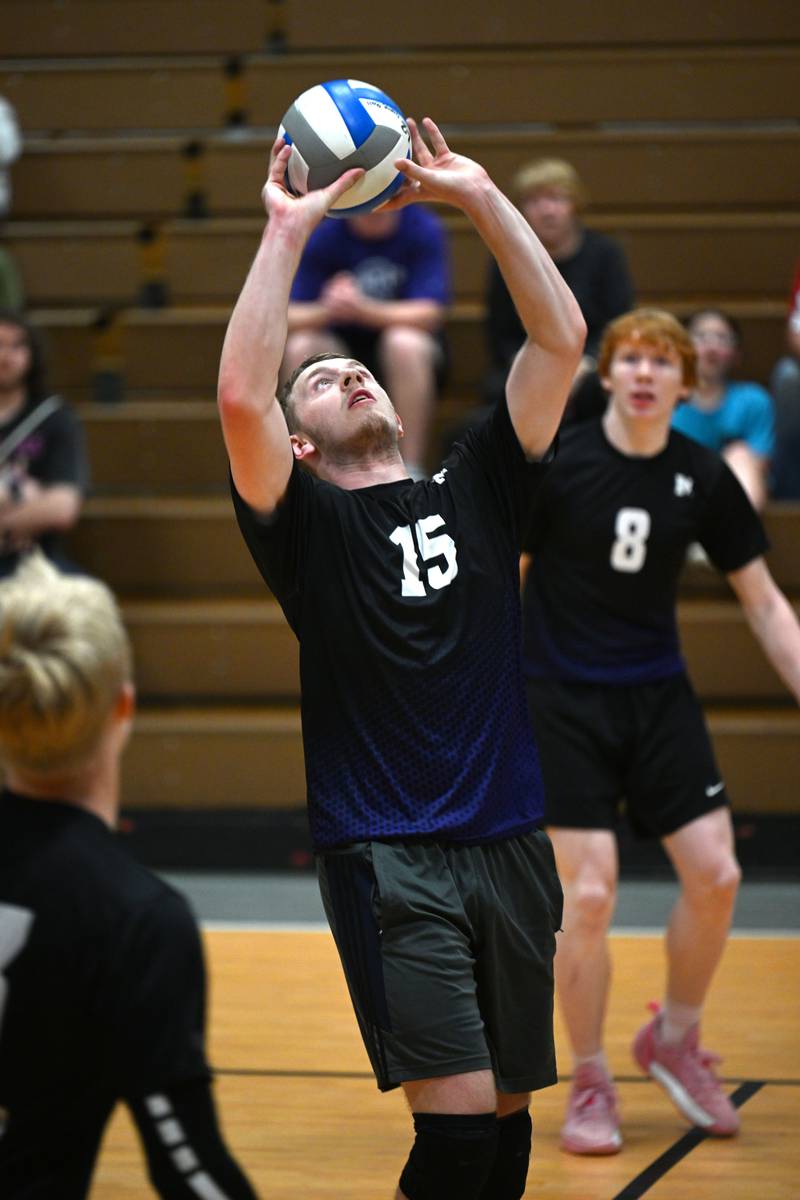 Manteno's Ben Milton prepares a set during the match against Kankakee Trinity Academy on Thursday, May 1, 2025.