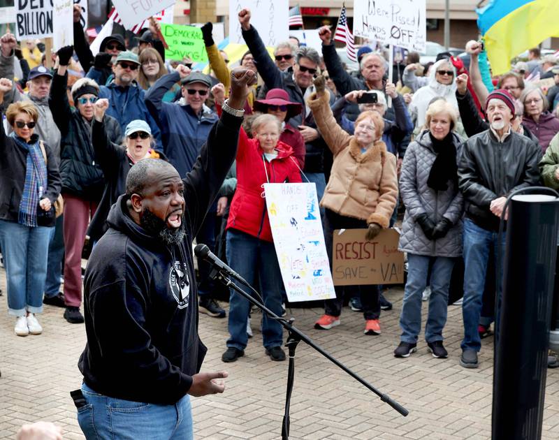 Rev. Joe Mitchell, lead pastor at New Hope Missionary Baptist Church in DeKalb, speaks passionately to the hundreds of people assembled Saturday, April 5, 2025, for a Hands Off! rally at Memorial Park on the corner of First Street and Lincoln Highway in DeKalb. The group gathered to protest against various policies of President Donald Trump and his administration.