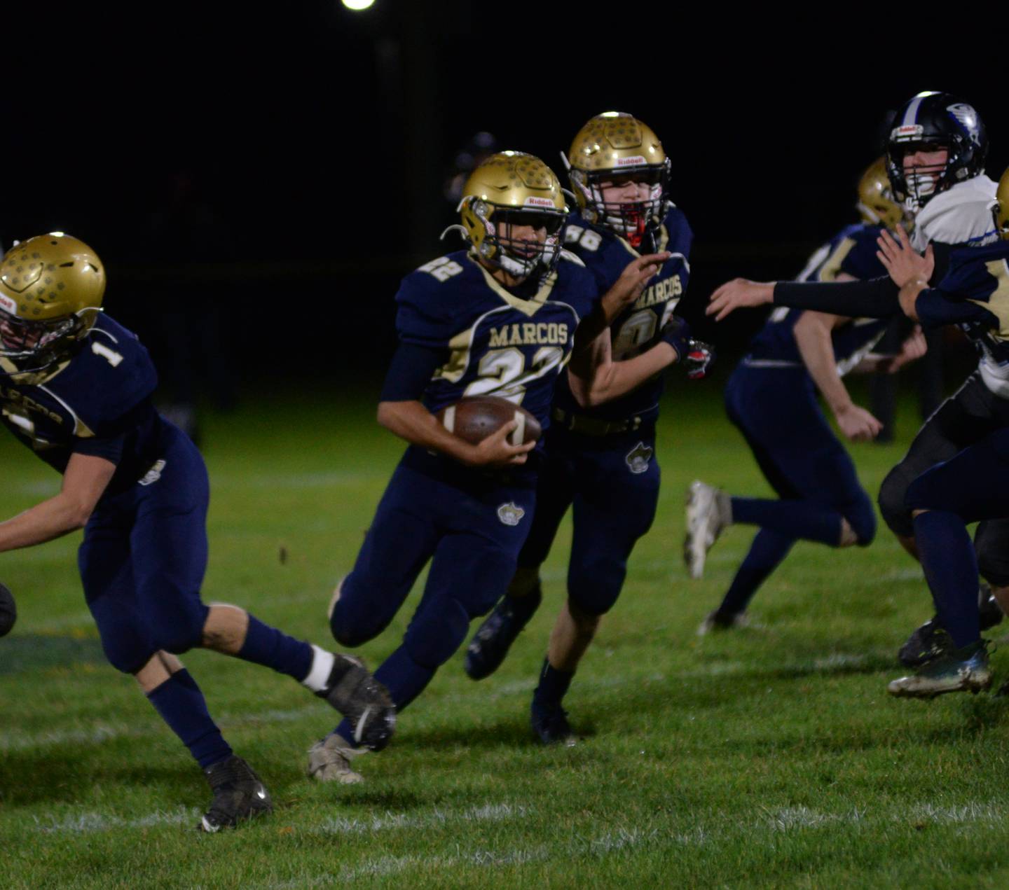 Polo's Delo Fernandez runs for a gain against West Prairie during 8-man football playoff action on Friday, Oct.27, 2023 at Polo High School.