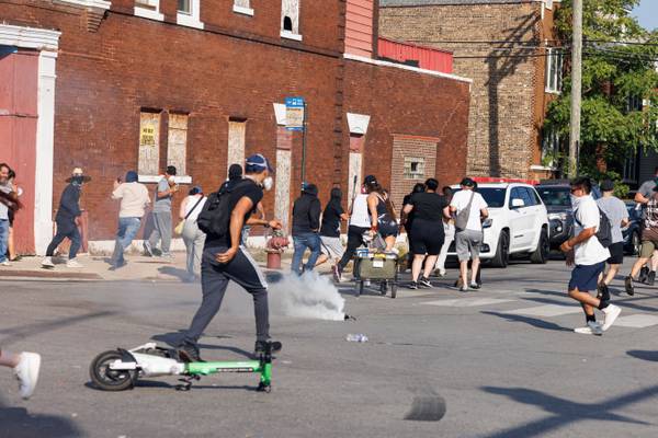 Using helicopters and chemical agents, immigration agents become increasingly aggressive in Chicago