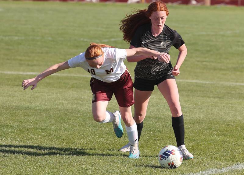 Morris' Danica Martin (left) and Sycamore's Izzie Segreti go after the ball during their Interstate 8 Conference Tournament semifinal game Wednesday, May 3, 2023, at Sycamore High School.