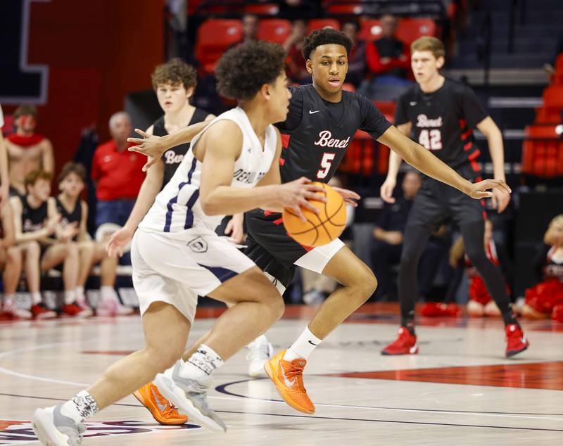Benet's Perry Tchiegne (5) pressures a DePaul College Prep player during the IHSA Class 4A boys basketball state semifinal Friday, March 13, 2026 at the State Farm Center in Champaign.