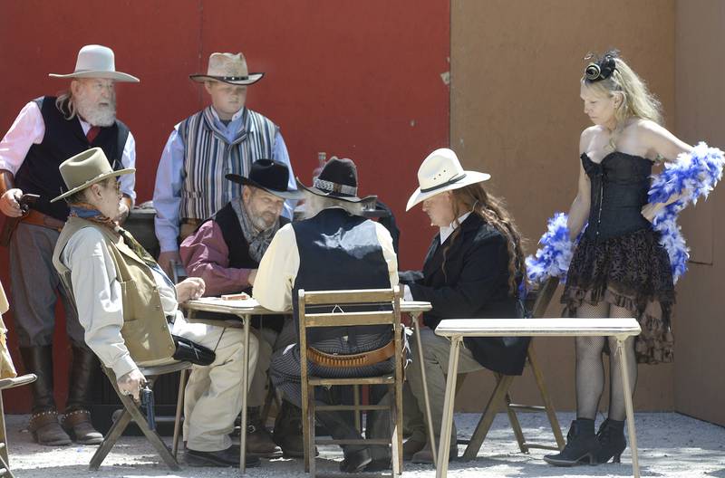 Wild Bill Hickok plays cards in Saloon No. 10 in Deadwood South Dakota where he was shot and killed. This was a reenactment by Old West Regulators of the life and times of Wild Bill Hickok on Saturday, May 27, 2023, in Utica.
