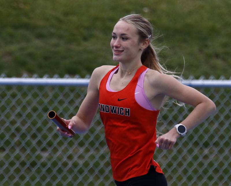 Sandwich’s Sundara Weberruns the first leg of the 4x800 meter relay during Kishwaukee River Conference Girls Track and Field Meet on Tuesday, May 5, 2025, at Woodstock High School.