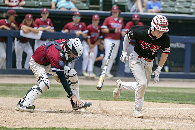 Henry-Senachwine’s Jacob Sharwarko sprints to first on a dropped third strike against Gibrault Saturday, June 3, 2023 during the IHSA class 1A championship baseball game.
