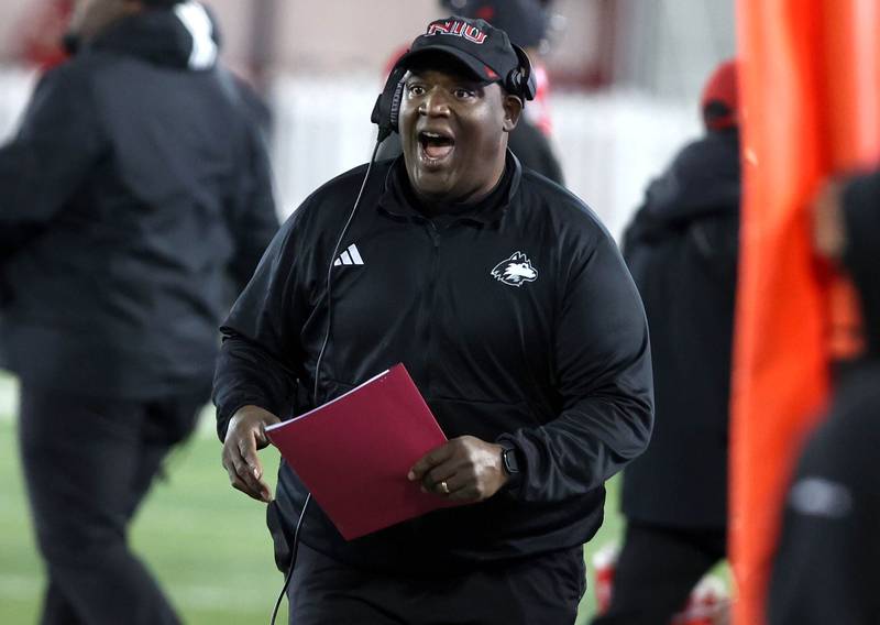 Northern Illinois head coach Thomas Hammock talks to his team during their game against Western Michigan Tuesday, Nov. 14, 2023, in Huskie Stadium at NIU in DeKalb.