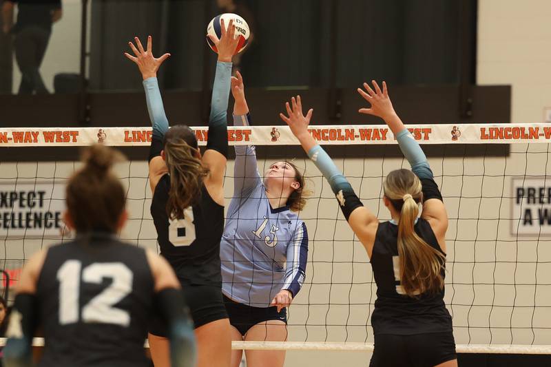 Plainfield South’s Savannah Stepanek stretches for the kill against Joliet Catholic in the Class 4A Lincoln-Way West Regional semifinal on Tuesday, Oct. 29, 2024 in New Lenox.