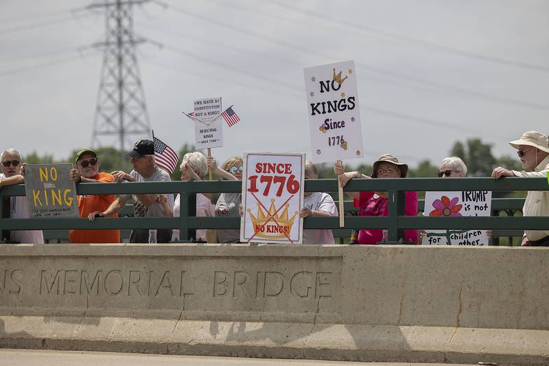 Protesters in Dixon join a nationwide No Kings protest Saturday, June 14, 2025. The anti-Trump gathering lined both sides of the Peoria Avenue Bridge.