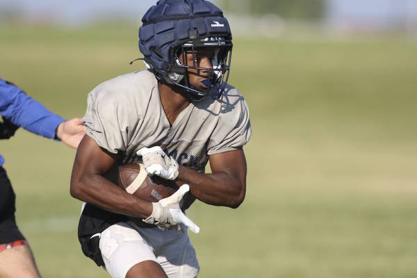 Photos: Oswego East football takes to the practice field