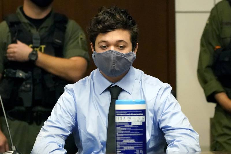 Kyle Rittenhouse sits while listening during an extradition hearing in Lake County court Friday, Oct. 30, 2020, in Waukegan, Ill. Rittenhouse is accused of killing two protesters days after Jacob Blake was shot by police in Kenosha, Wis. (AP Photo/Nam Y. Huh, Pool)