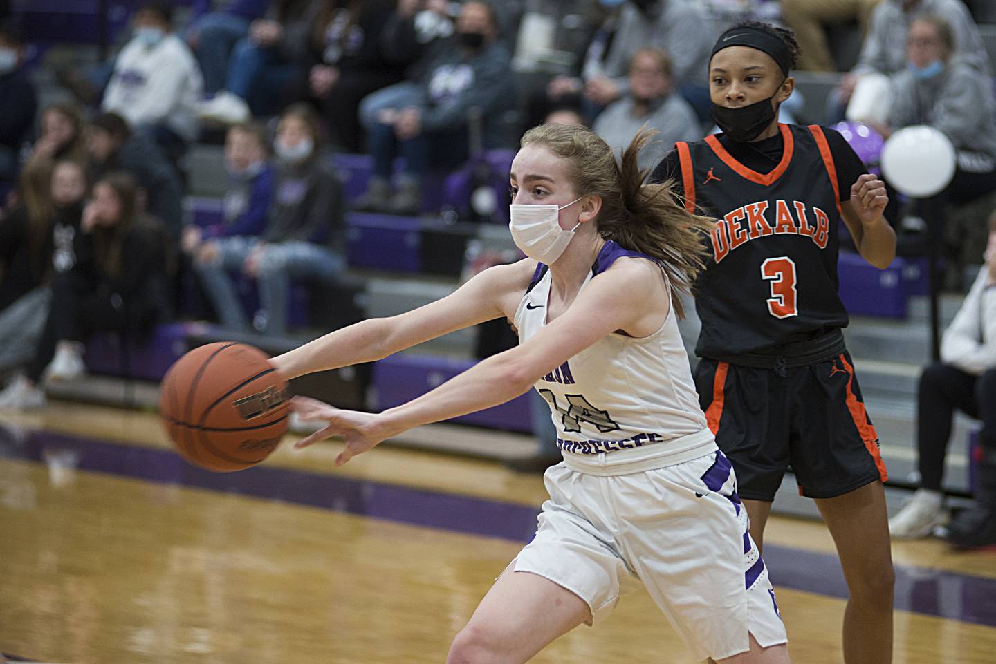 Dixon's Abby Knipple passes the ball against DeKalb on Monday, Jan. 24, 2022.