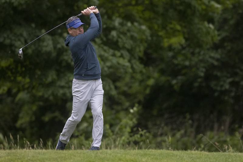 Scott Atkins drives off the second tee during the Pine Hills golf tournament on Sunday, June 11, 2023 in Ottawa.