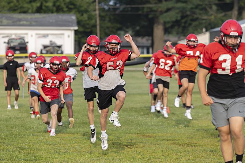 Amboy football players run through drills Monday, July 24, 2023 during a camp at the high school.