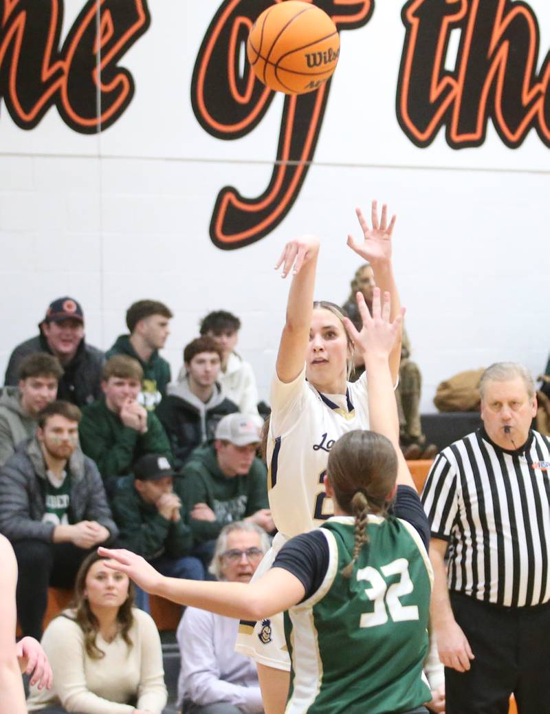 Marquette's Kaitlyn Davis shoots a jump shot over St. Bede's Quinn McClain during the Tri-County Conference championship game on Thursday, Jan. 23, 2025 at Roanoke-Benson High School.