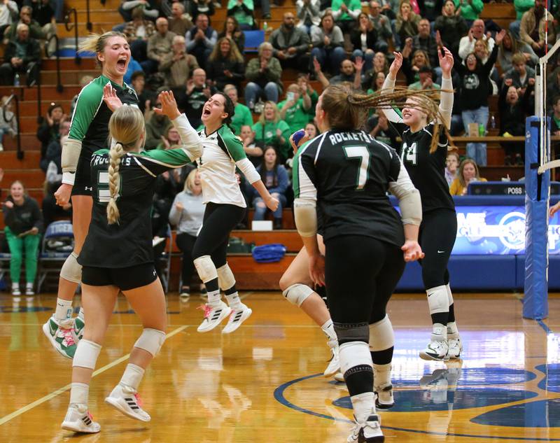Members of the Rock Falls volleyball team react after defeating Illinois Valley Central during the Class 2A Sectional final game on Wednesday, Nov. 1, 2023 at Princeton High School.