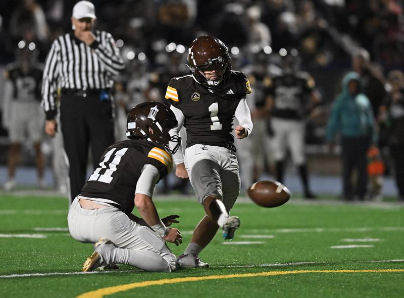 Joliet Catholic's Vinny DiNovo (1) kicks a field goal during the conference game against Providence Catholic on Friday, OCT. 24, 2025, at Joliet.