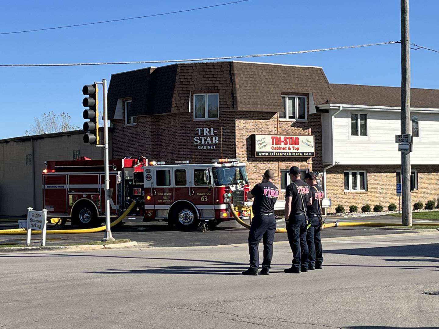 Firefighters responding to a fire on Thursday, Oct. 17, 2024, at Tri-Star Cabinets and Top Company in New Lenox.