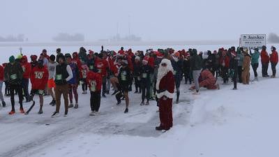 Photos: Santa spirit takes over Spring Valley for annual 5K race