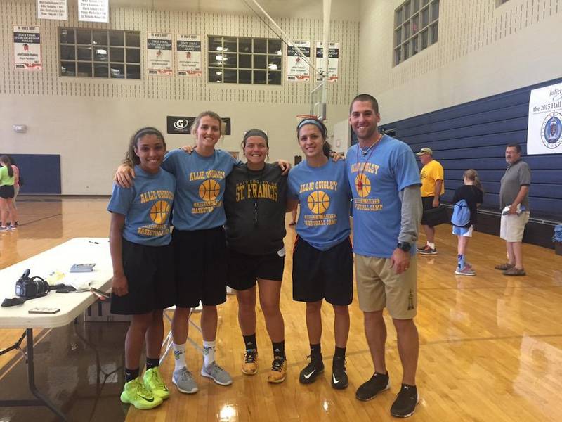 From left, there's JCA basketball player Mia Farrell, Allie Quigley, Allie's sister and USF women's coach Sam Quigley, JCA player Andriana Acosta and Ryan Quigley, Allie's brother and a lower-level coach in the JCA girls program.