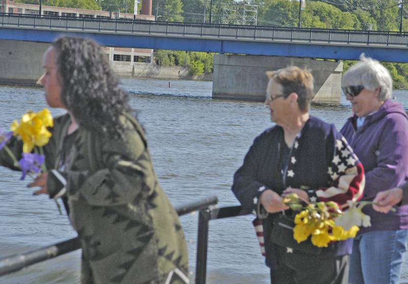 Rock Falls American Legion Post 902 hosted a ceremony at Lower Dam Park in Rock Falls on Monday, May 26, when attendees threw flowers into the Rock River in remembrance of loved ones.