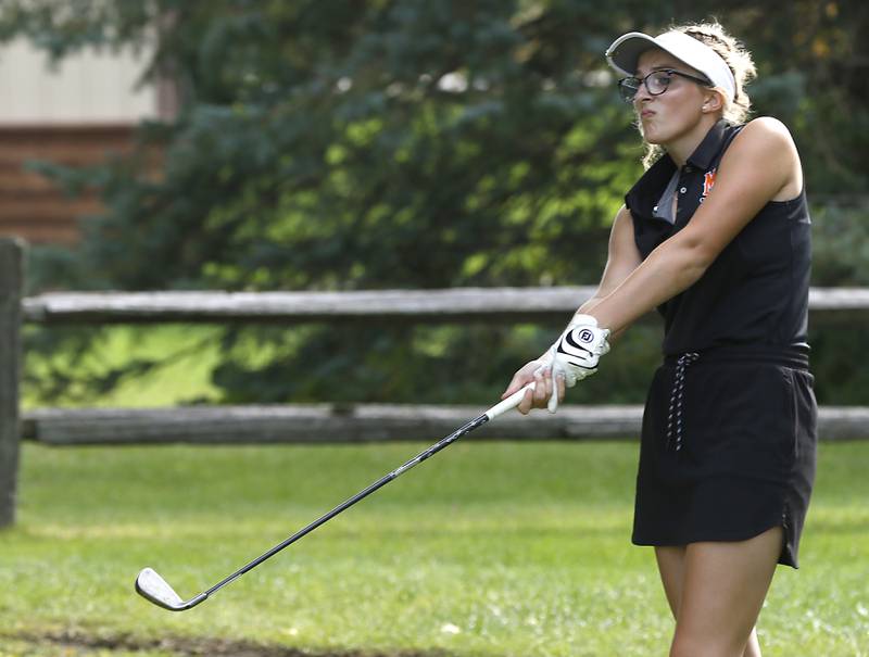 McHenry’s Shania Houston watches her fairway shot on the ninth hole during the Fox Valley Conference Girls Golf Tournament Wednesday, Sept. 21, 2022, at Crystal Woods Golf Club in Woodstock.