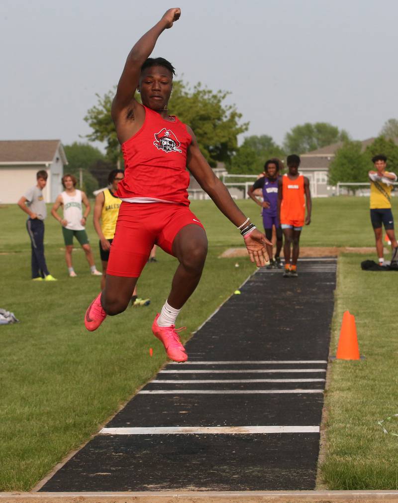 Ottawa's Keevon Peterson competes in the long jump during the Class 2A track sectional meet on Wednesday, May 17, 2023 at Geneseo High School.