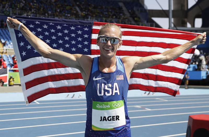 United States' Evan Jager celebrates after winning the silver medal in the men's 3000-meter steeplechase final during the athletics competitions of the 2016 Summer Olympics at the Olympic stadium in Rio de Janeiro, Brazil, Wednesday, Aug. 17, 2016. (AP Photo/Matt Slocum)