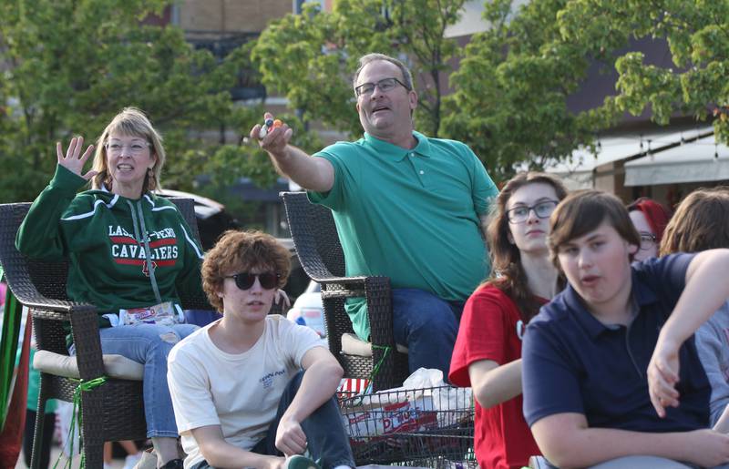 Peru mayor Ken Kolowski and his family wave and throw candy during the L-P Homecoming parade on Thursday, Oct. 5, 2023 downtown La Salle.