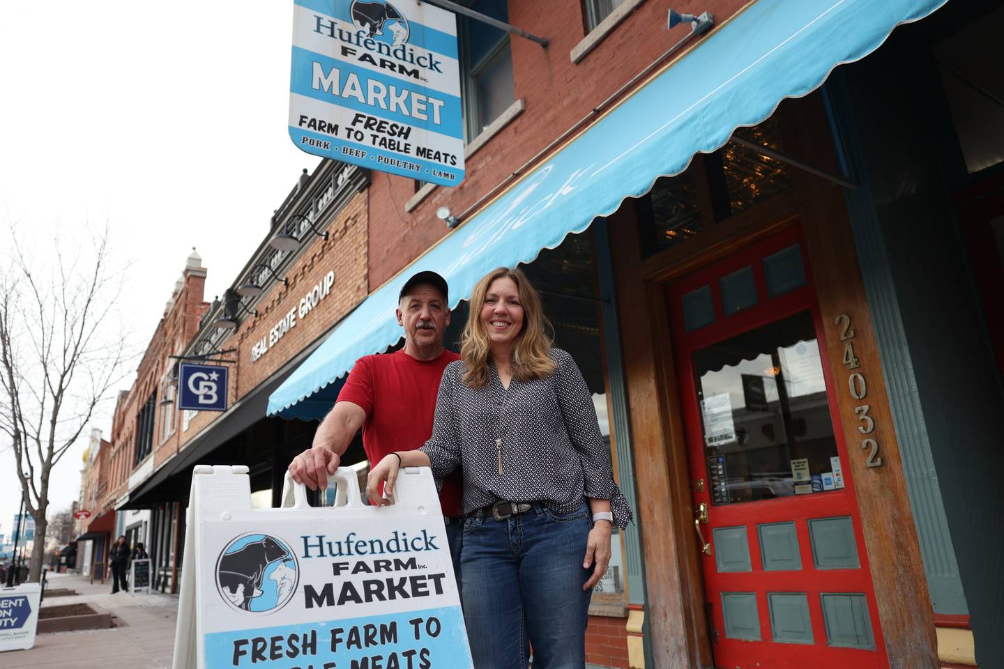 Mike and Debra Hufendick stand in front of their Hufendick Farm Market in Downtown Plainfield on Tuesday, February 21st, 2023.
