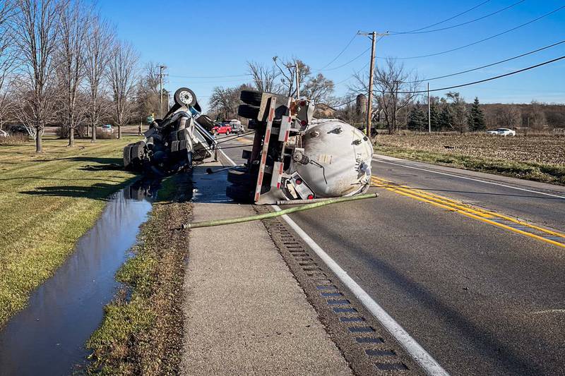 A semi-truck overturned in a five-vehicle crash in Woodstock Friday.