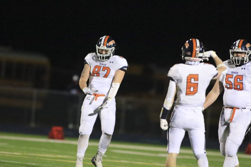 Oswego's Anthony Cikauskas celebrates a big defensive stop during football game between Oswego at Plainfield South.  March 19.  Gary E Duncan Sr for Shaw Local.