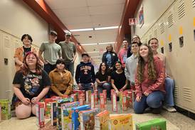 Photos: Streator High School students collect 750 boxes of cereal for dominoes video, and donation to pantry