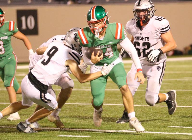 L-P's Easton Moriarty runs the ball past Kaneland's Carter Grabowski on Friday, Oct. 17, 2025 at Howard Fellows Stadium.