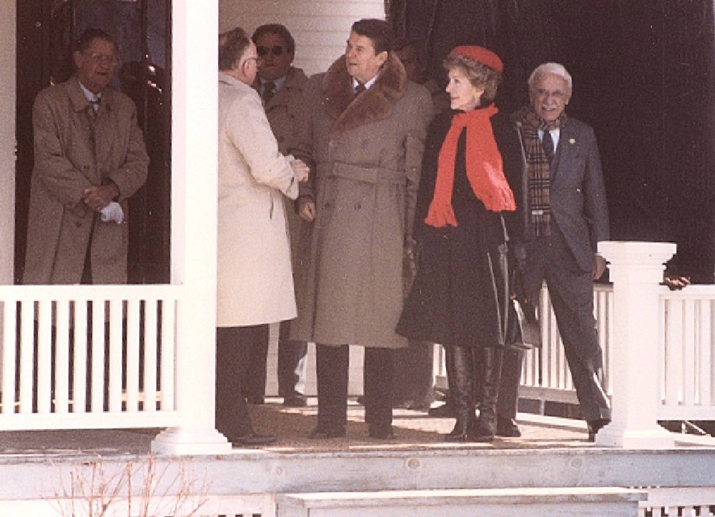 President Ronald Reagan receives a commemorative key to his boyhood home. From left are Neil Reagan, Cal Covert, Ronald and Nancy Reagan and Dan Terra.