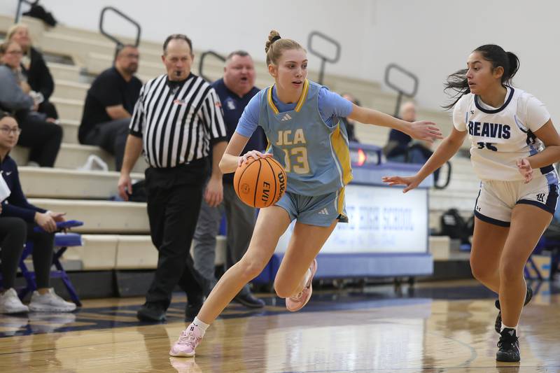 Joliet Catholic’s Abby Dulinsky makes a move to the baseline against Reavis in the Peotone Blue Devils Holiday Classic championship game on Monday, Dec. 29, 2025 in Peotone.