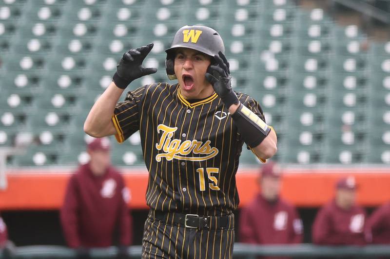 Joliet West’s Bobby Malinowski celebrates a walk-off single in extra innings against Lockport in the WJOL Don Ladas Memorial baseball tournament championship game on Saturday, April 4, 2026 in Joliet.