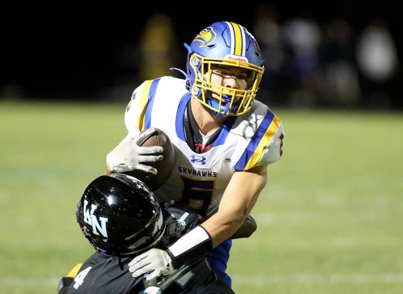 Johnsburg’s Brett Centnarowicz runs the ball in varsity football on Friday Sept. 27, 2024, at Woodstock North High School in Woodstock.