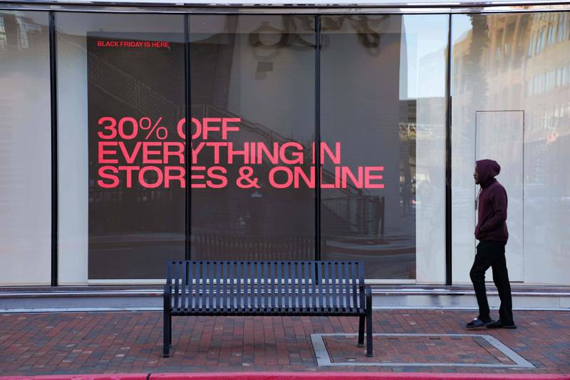 Shoppers browse for Black Friday deals at Atlantic Station outdoor mall, Friday, Nov. 28, 2025, in Atlanta, Ga. (AP Photo/Megan Varner)