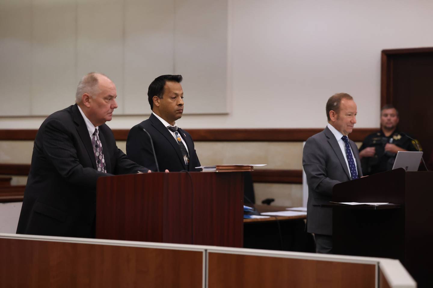 Attorney Jeff Tomczak, left, along with his client Javier Esqueda and prosecuting attorney Mark Shlifka attend a status hearing for Javier Esqueda at the Kendall County Courthouse. Esqueda faces official misconduct charges for leaking video of Eric Lurry’s arrest. Lurry died from a drug overdose. Tuesday, June 14, 2022 in Yorkville.