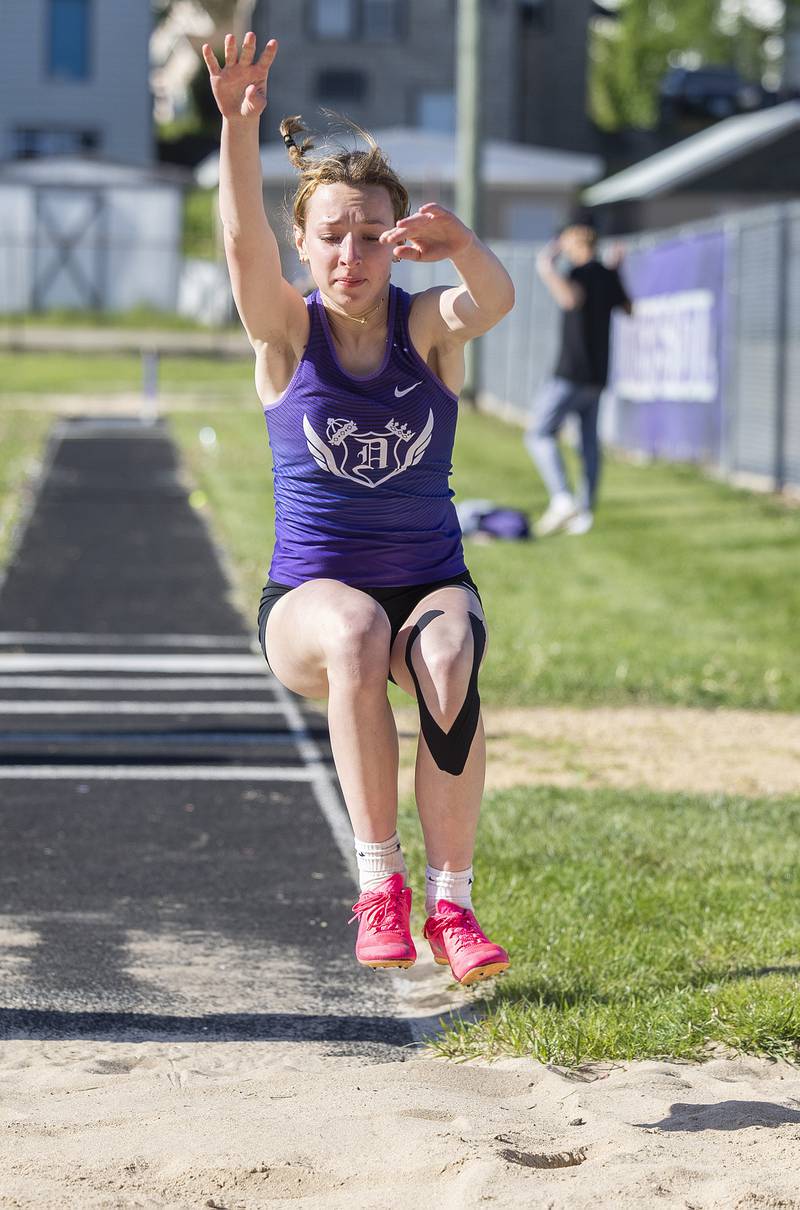 Dixon’s Carly Dallas looks to land her triple jump attempt Thursday, May 8, 2025, during the girls Big Northern Conference track meet.