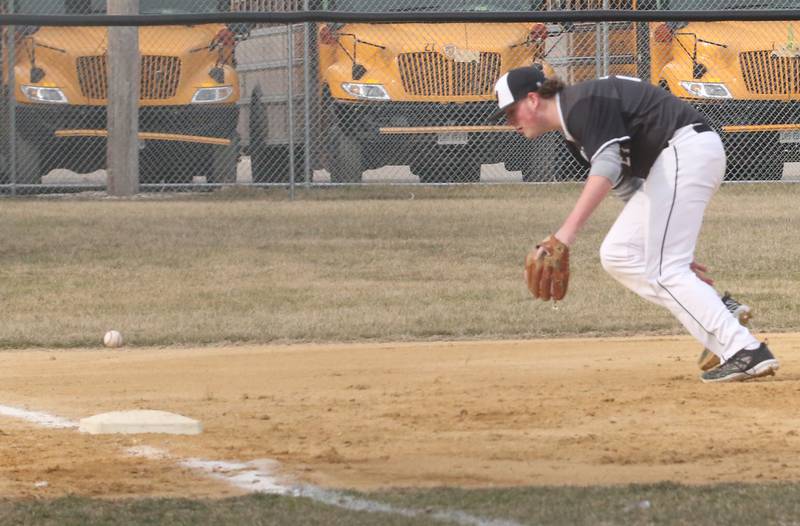 Woodland/Flanagan-Cornell's Alec Fiazier misses a ground ball while playing third base against Streator on Wednesday, March 15, 2023 at Woodland High School.