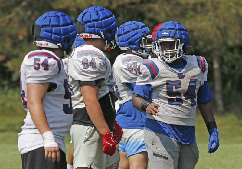 Dundee-Crown's Xavier Ingram gives instructions to the linemen during football practice on Tuesday, July 29, 2025, at Dundee-Crown High School in Carpentersville.