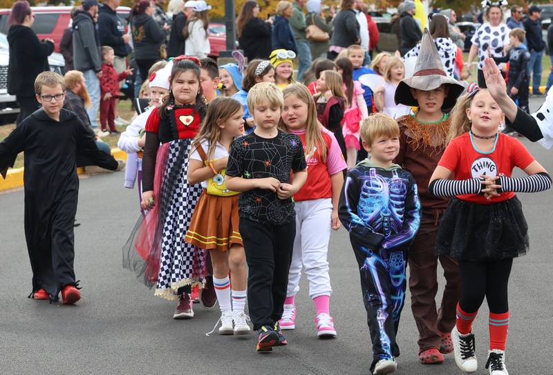 Students from Jefferson Elementary walk around the school during a Halloween parade on Friday, Oct. 31, 2025 in Princeton.