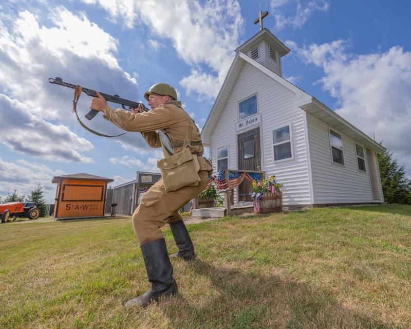 Ignas Endriulatis, a reenactor for the Soviet military guards St. Johns Church during the town battle at the Ottawa Military Show on July 12, 2025 in rural Ottawa.